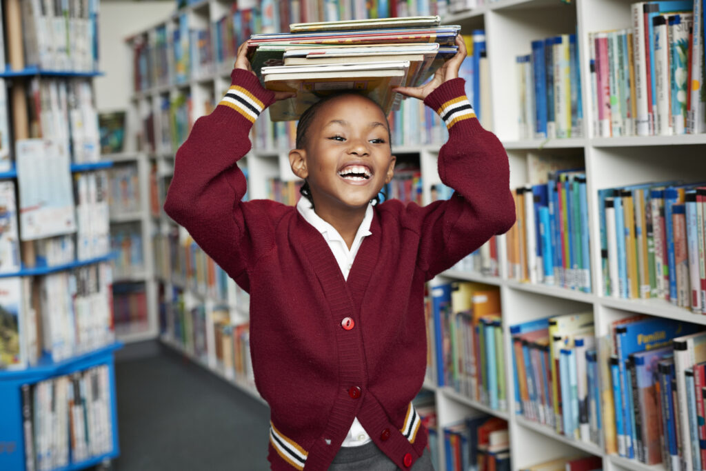 happy girl in library