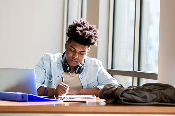 Teen boy studying