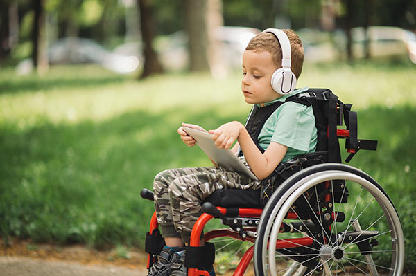 boy with special needs in wheelchair