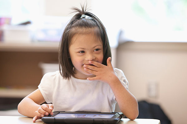 Little girl on tablet