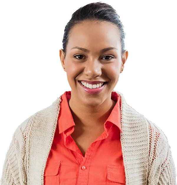 A smiling teacher in her classroom