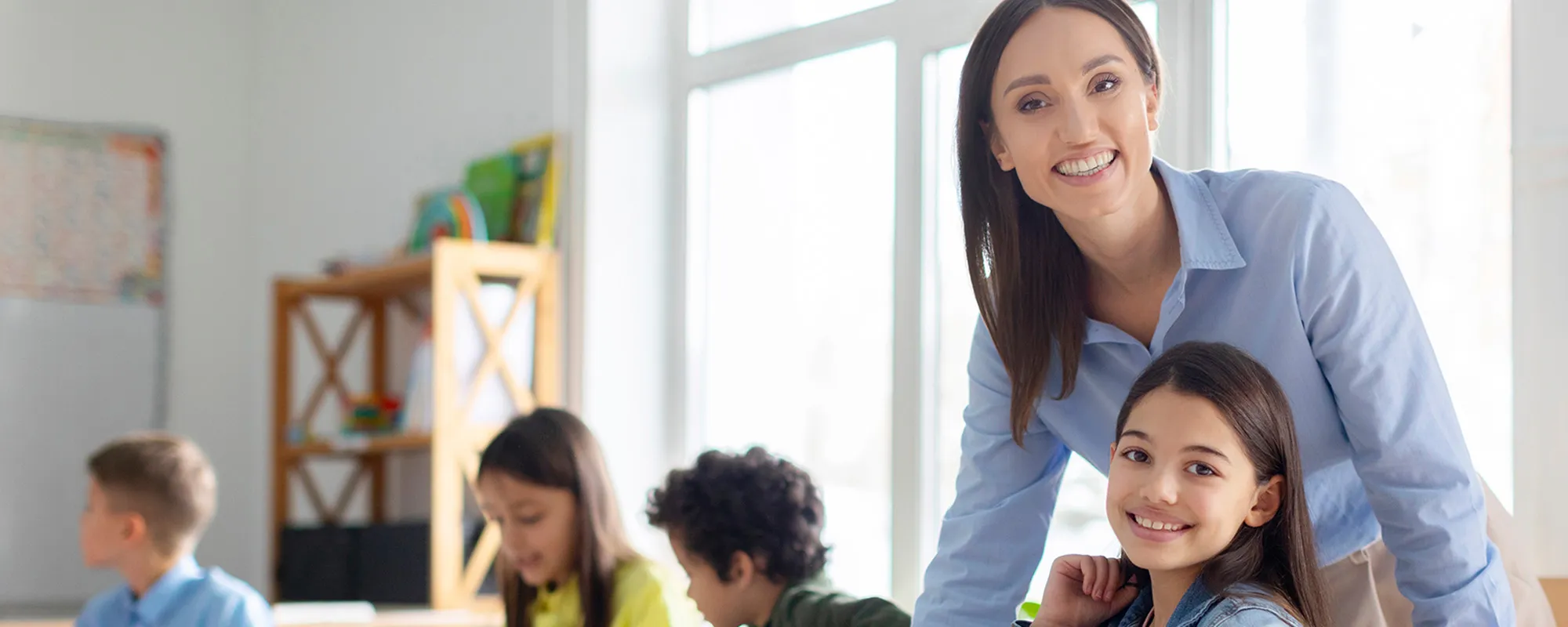 A teacher and her students in a classroom