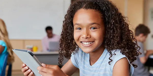 A girl using Renaissance on a tablet