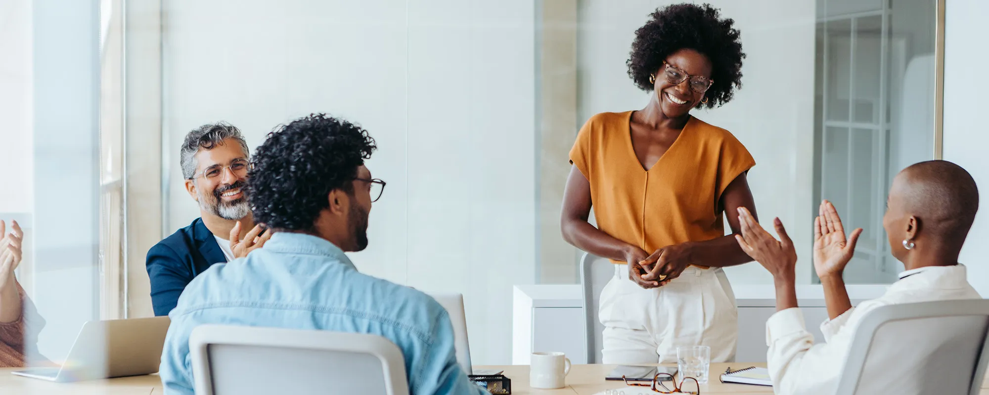 A group of employees in a conference room