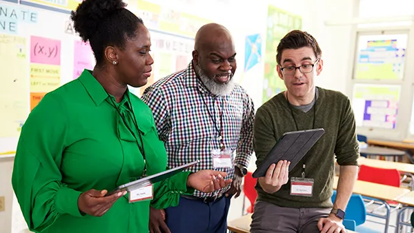 Teachers using Renaissance software on a tablet computer